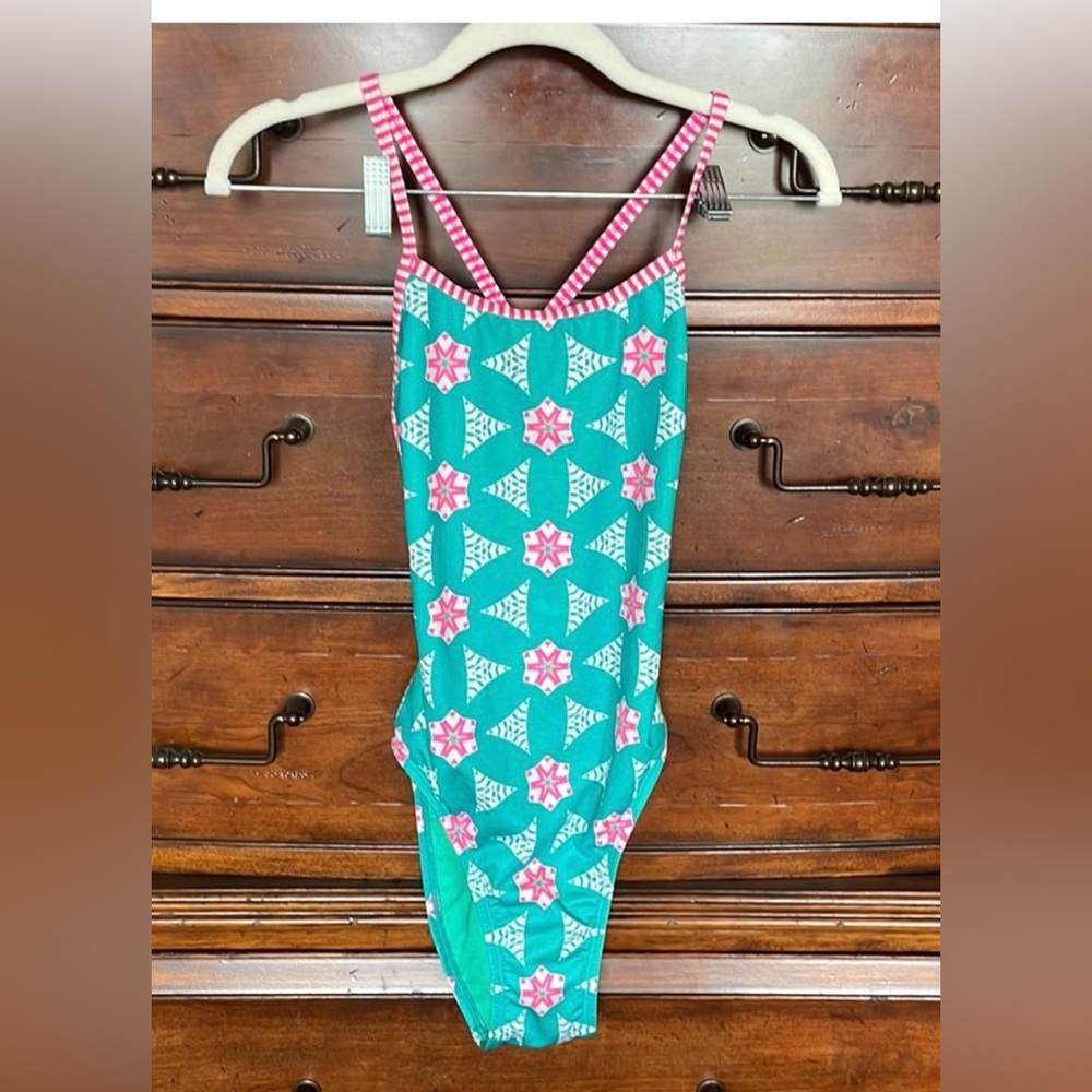 Dolfin size 34 women’s swimsuit. Pretty turquoise and pink!